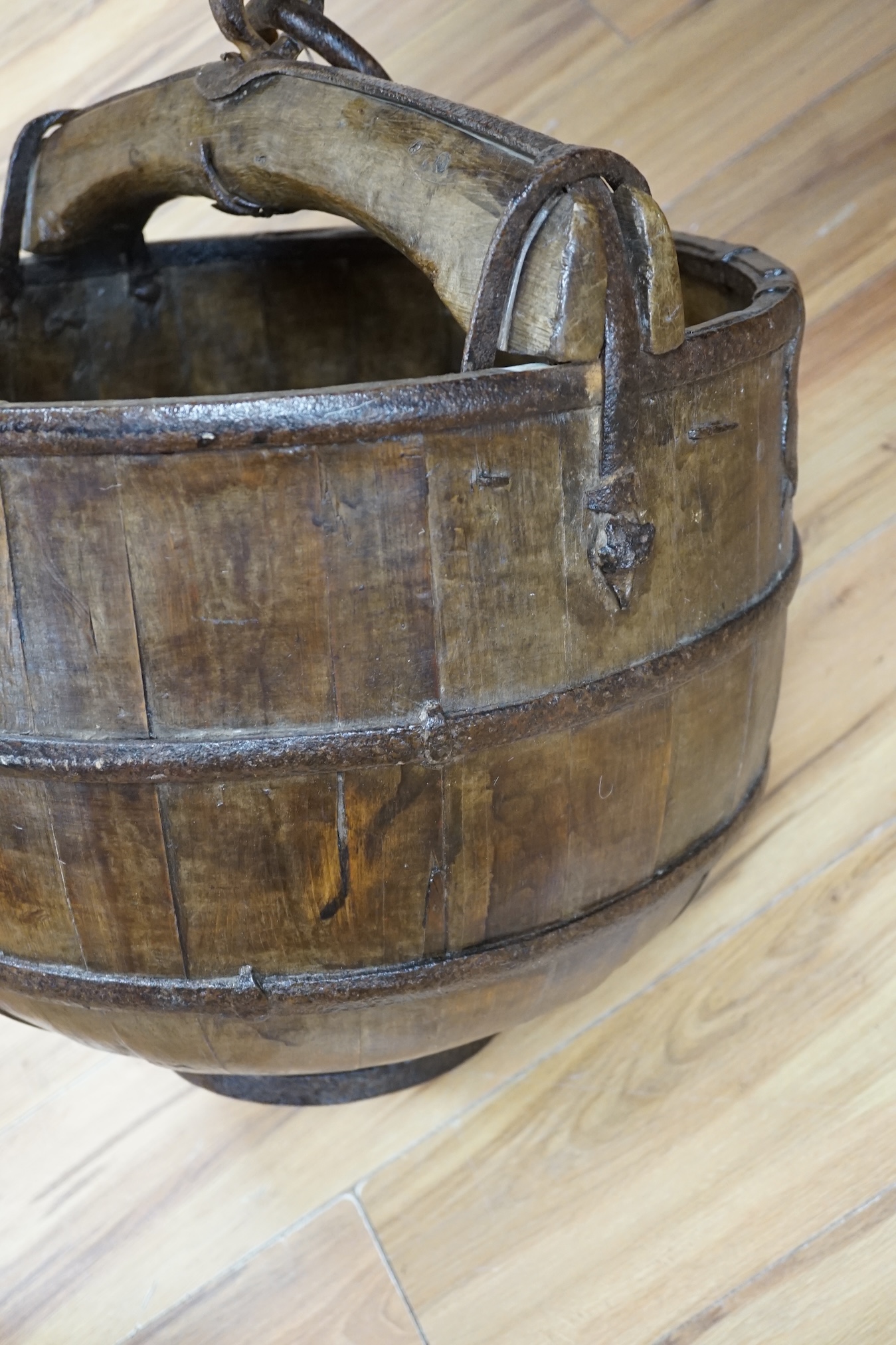 A Chinese coopered well bucket, 60cm high. Condition- fair to good
